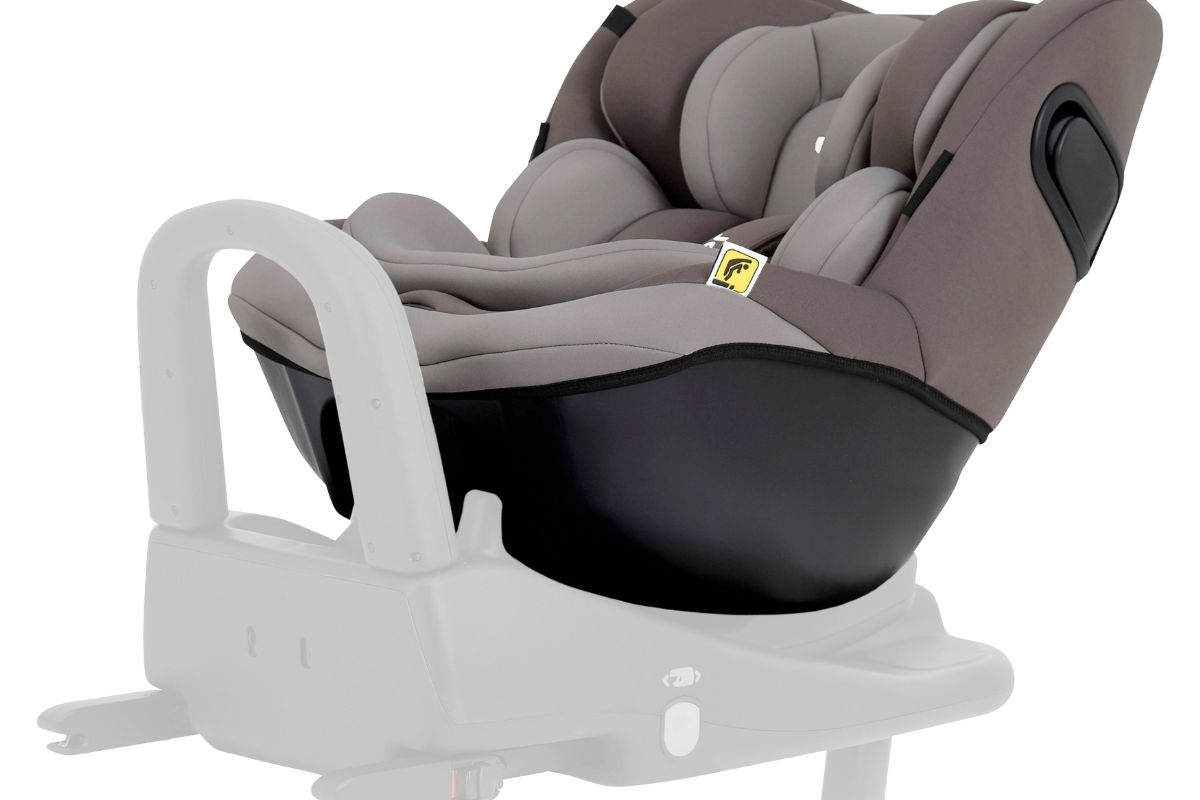 Gray child car seat mounted on a white rotating base against a plain background.