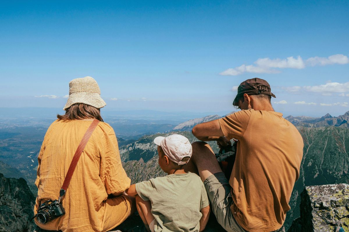 Family enjoying mountain views during a family vacation in Canada.
