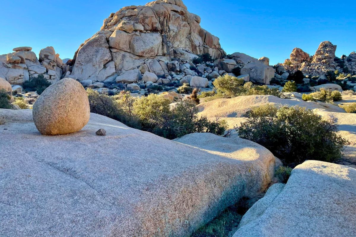 Rocky desert landscape with large boulders, ideal for adventurous national park trips with kids.