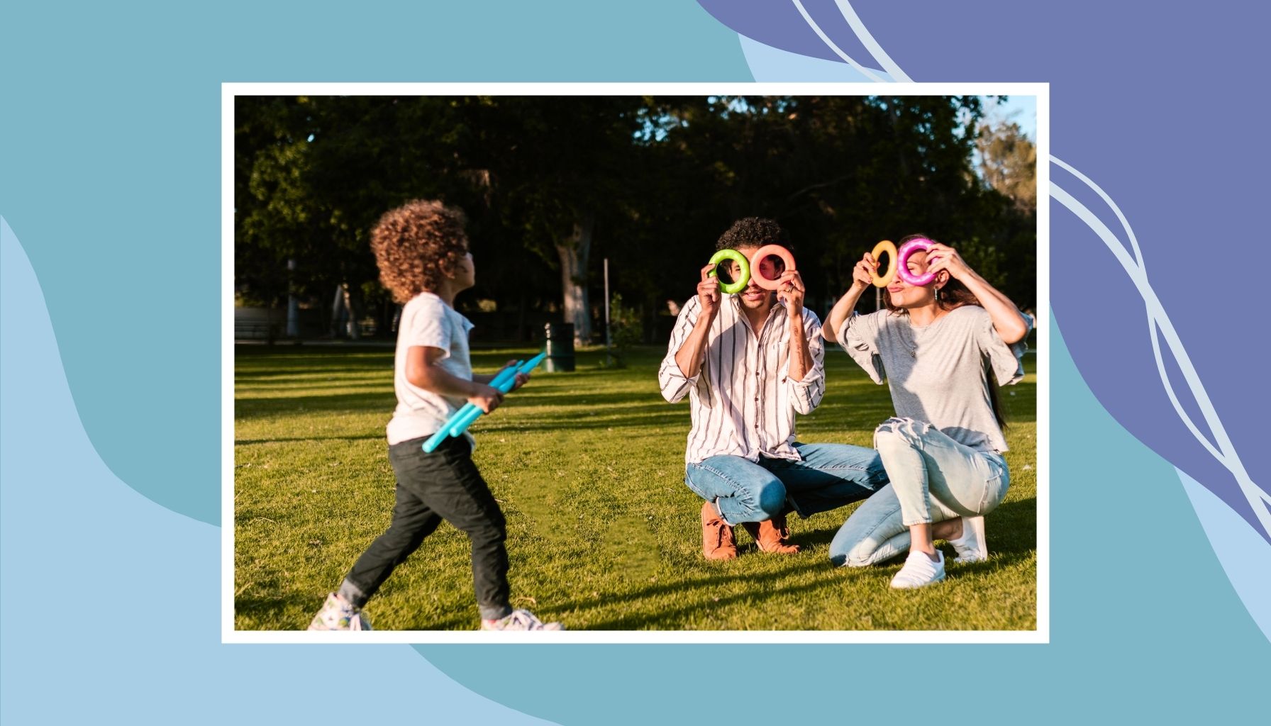 Family playing outside in a park, representing kid-friendly national park adventures for families.