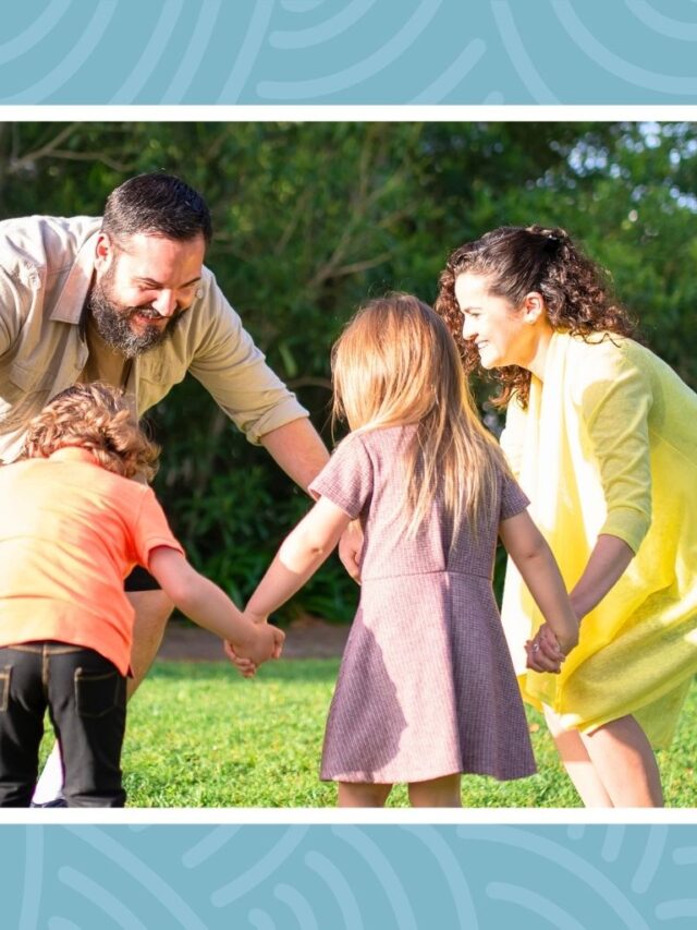 Family playing outdoor games together during fun weekend family activity.