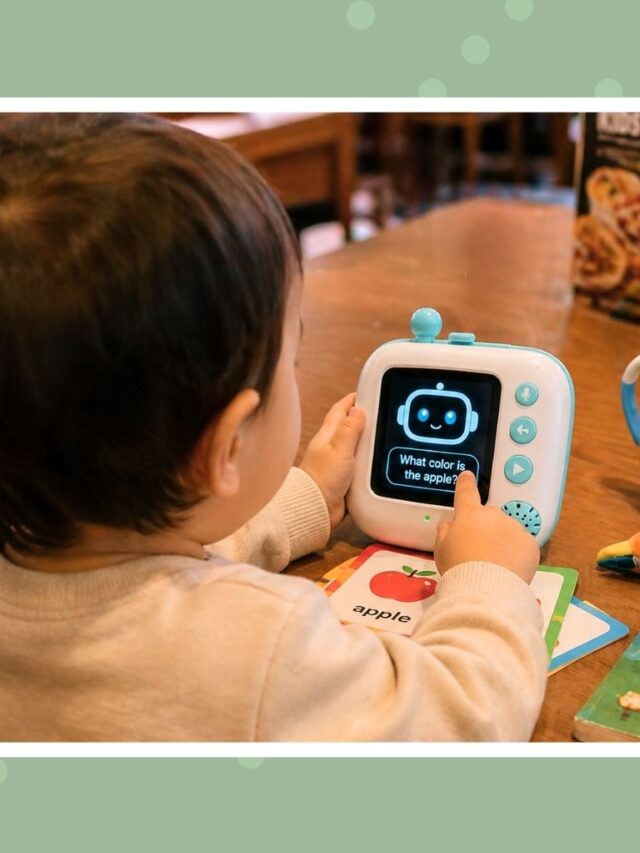 Toddler playing with an AI interactive learning toy at a restaurant table, keeping busy with flashcards and a screen-free activity during mealtime.