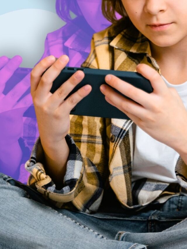 Child using a smartphone to illustrate healthy kids screen time habits at home.