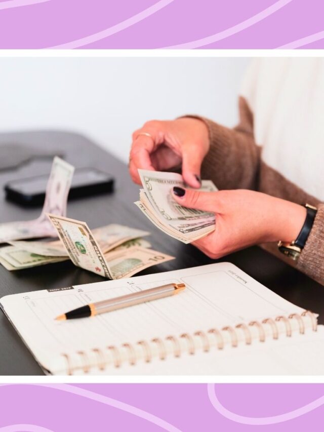 Woman counting cash beside a meal planner for grocery budgeting tips.