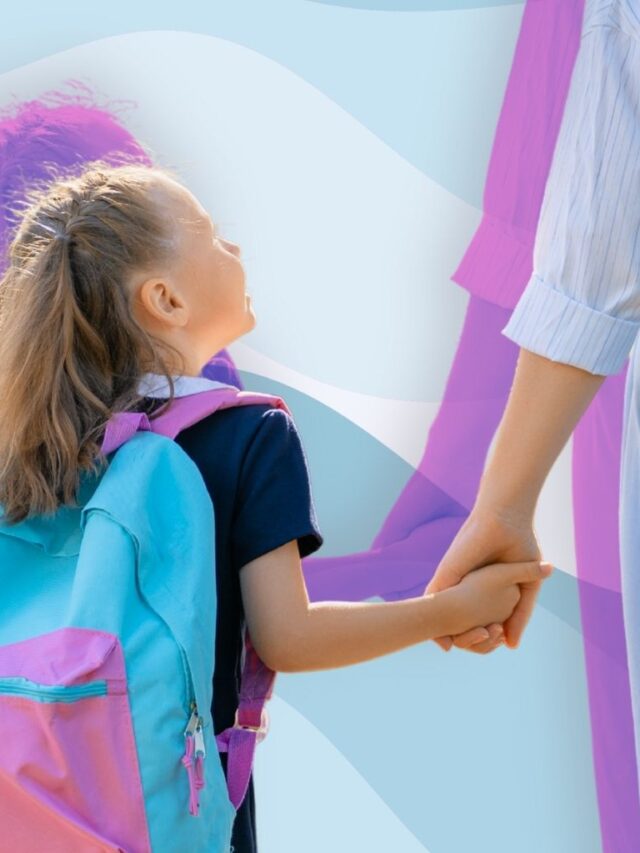 Parent holding a child’s hand as she carries a colorful backpack while preparing for the first day of school.