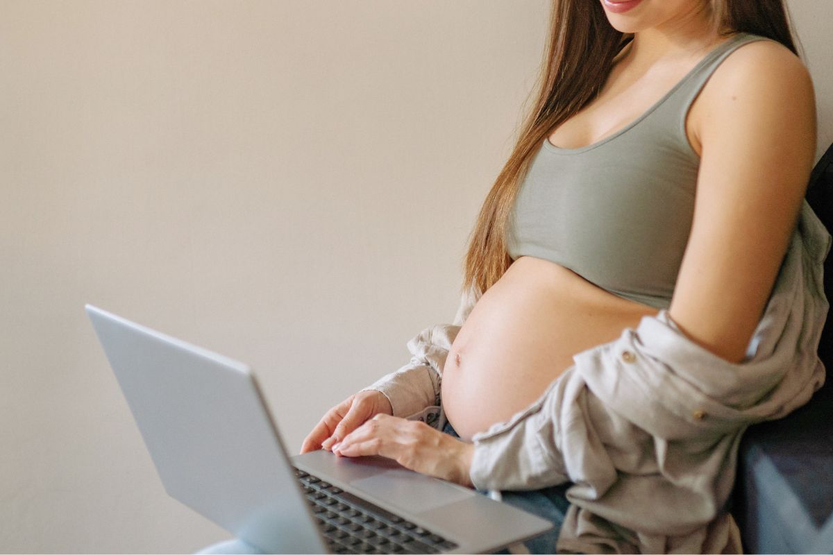 Expecting mother researching simple ways to prepare for a newborn baby.