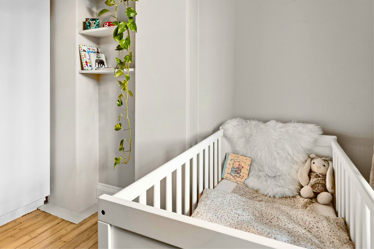Simple baby nursery setup for parents preparing their home for a newborn.