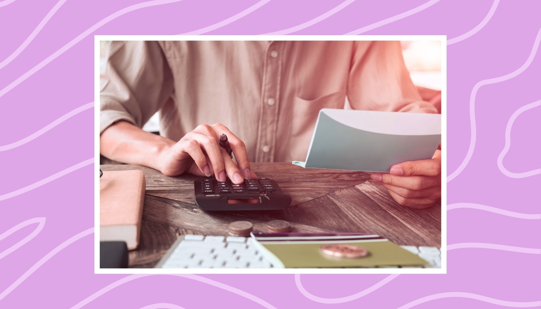 Person reviewing bills and using a calculator to track monthly income and expenses at home.