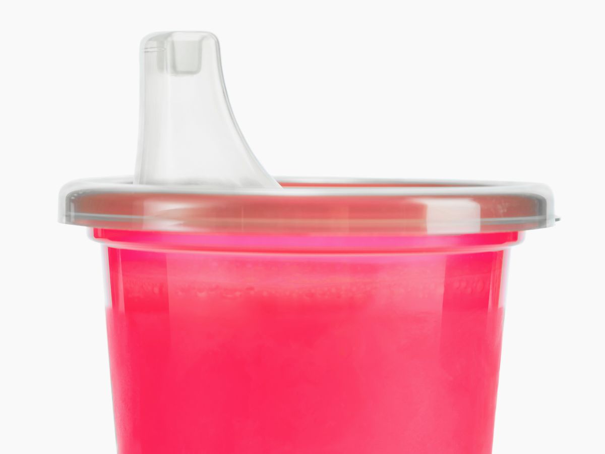 A colorful sippy cup for toddlers.