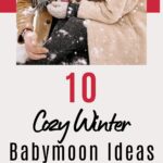 Expecting couple cuddling together in the snow while holding a warm drink during a cozy winter babymoon.