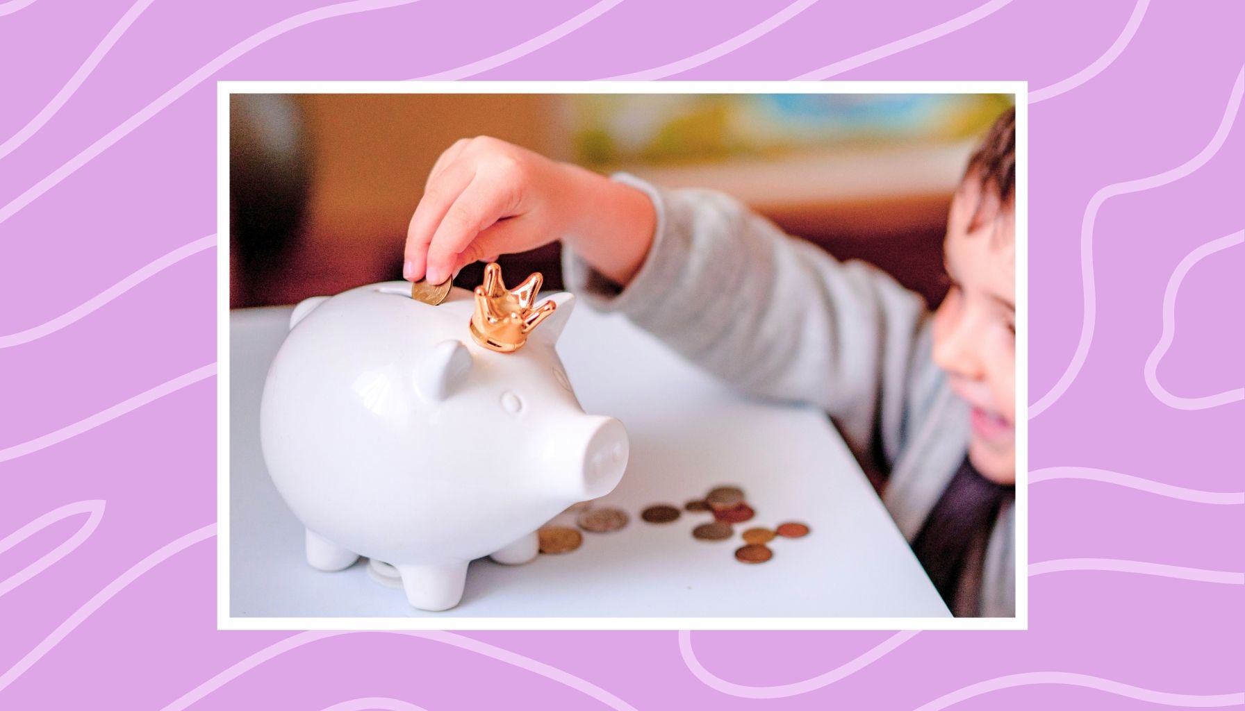 Child putting coins into a piggy bank, showing saving up for a toy and learning patience.