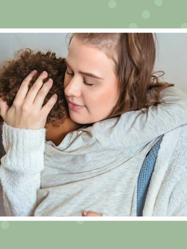 Parent hugging and comforting a toddler after a tantrum to help them feel safe and calm.