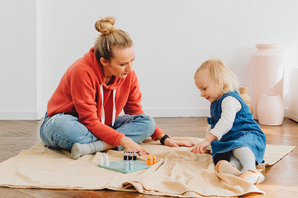Parent calmly spending one-on-one time with a toddler after an emotional moment.